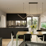 Innenraumvisualisierung einer schwarzen Küche mit Küchenblock und Jean Prouve Stühlen. Darstellung eines modernen Wohnens.